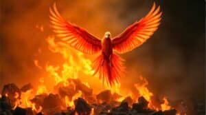 baby phoenix flying on top of a burning fire