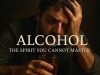 A hyper-realistic image of a man sitting alone at a dimly lit bar, head bowed with a glass of whiskey in hand. The atmosphere is moody and reflective, symbolizing the spiritual and psychological struggle behind alcohol. Text on image reads: “Alcohol — The Spirit You Cannot Master.