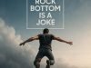 Motivational graphic featuring a man in a gray t-shirt and jeans leaping joyfully with arms outstretched against a vast blue sky with scattered white clouds at sunset; bold white text overlay reads "ROCK BOTTOM IS A JOKE" in a square frame.