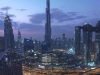 Hyper-realistic square image of Burj Khalifa rising at dawn over Dubai skyline, symbolizing expat burnout transformation and radical rise with Coach G's R.I.S.E.™ Method