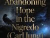 Square alchemical graphic featuring gothic gold text "Abandoning Hope in the Nigredo (Carl Jung)" on swirling black midnight blue background with faint dissolving raven symbols and subtle indigo glows representing the Nigredo stage.
